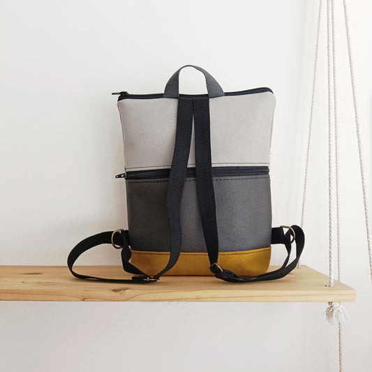 Mochila alta con circulitos, mostaza y gris claro